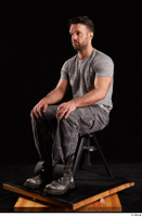  Larry Steel  1 boots dressed grey camo trousers grey t shirt shoes sitting whole body 0008.jpg